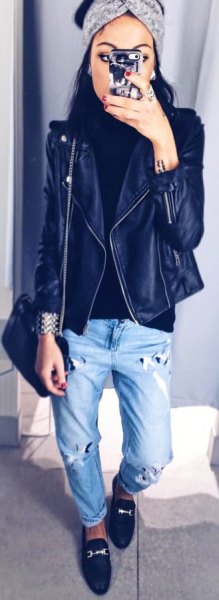 black leather jacket with boyfriend cuff jeans and royal blue slippers