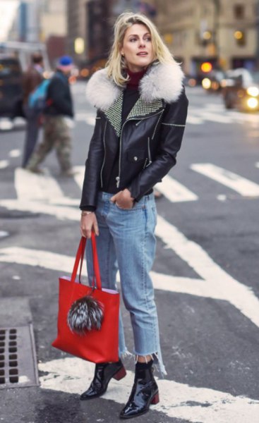 black leather jacket with cropped boyfriend jeans and ankle boots