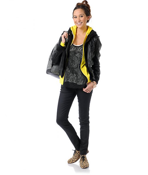 black leather jacket with lemon yellow hoodie and top with scoop neck