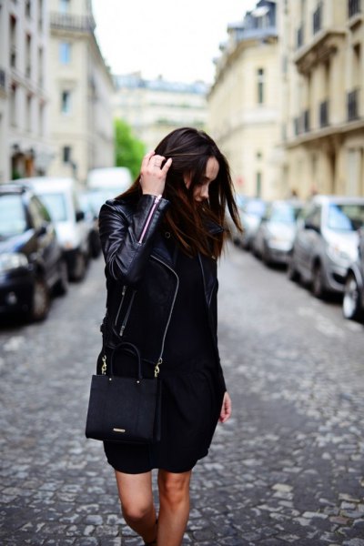 black leather jacket with mini shift dress and wallet