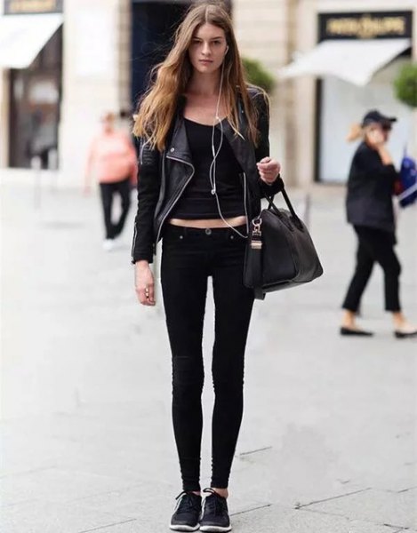 black leather jacket with crop top with scoop neckline and skinny jeans