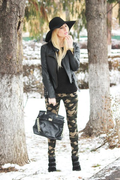 black leather jacket with skinny jeans and floppy hat