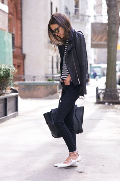 black leather jacket with striped t-shirt and white, pointed straps