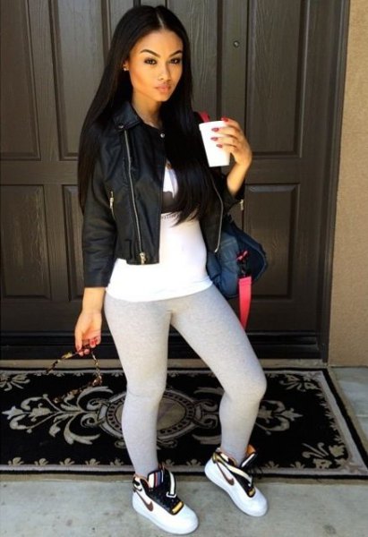 black leather jacket with white tunic t-shirt and leggings