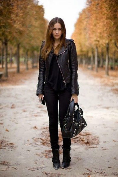 black leather riding jacket with scoop neckline and skinny jeans