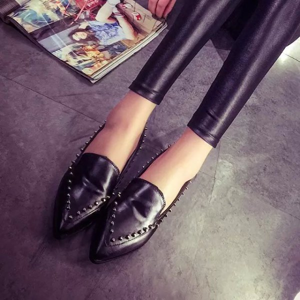 black leggings with matching wing tip shoes with rivets
