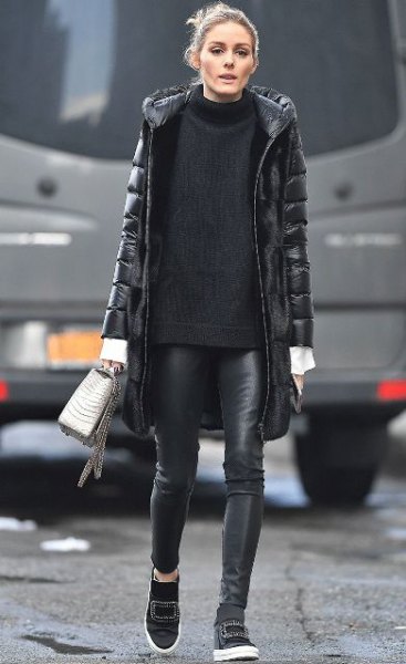 black long puffer coat with comfortable sweater with stand-up collar and leather gaiters