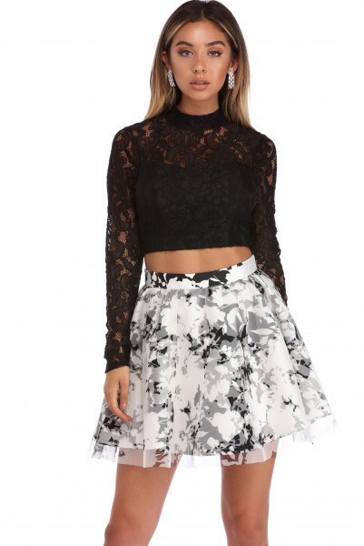black long-sleeved skater skirt with a lace crop top and floral print