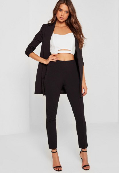 black longline blazer with a shortened white chiffon blouse and open toe heels