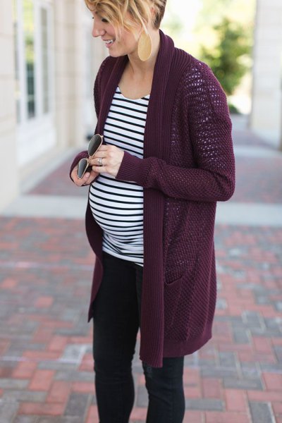 black long-line maternity jacket with a striped long-sleeved T-shirt with a relaxed fit