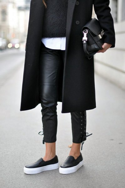 black longline wool coat with leather gaiters