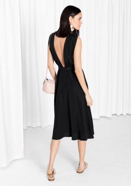 black linen flare dress with a low back