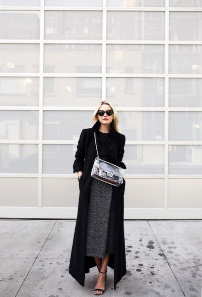 black maxi coat with sweater and gray midi heather skirt