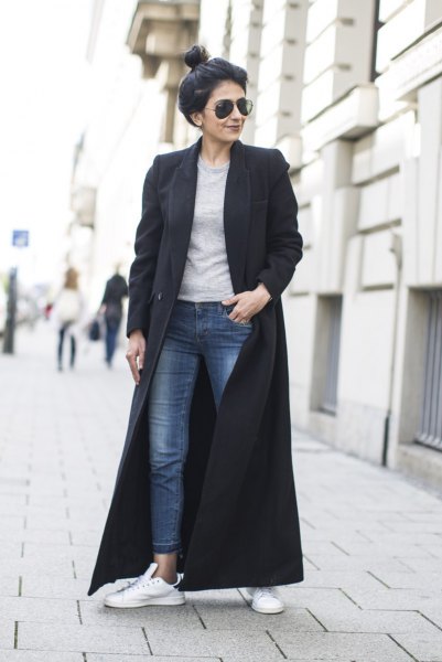 black maxi wool coat with gray sweatshirt and ankle jeans
