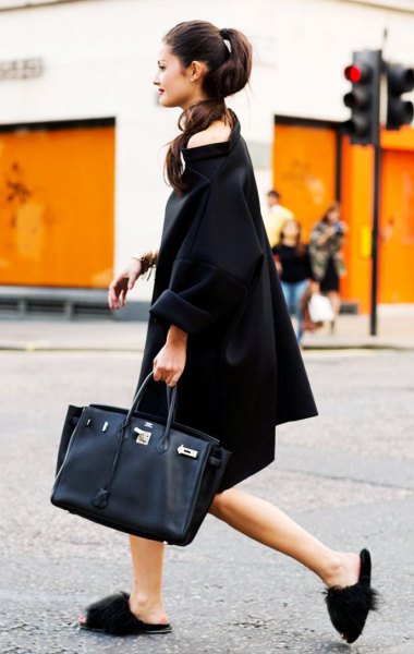 black midi sheath dress with boat neckline, slippers and black leather handbag