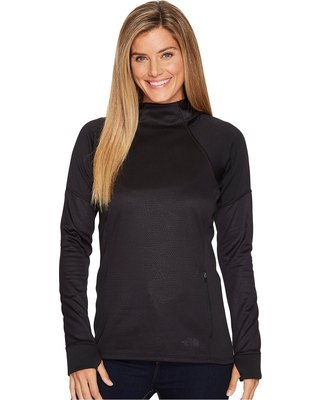 black long-sleeved sweater with mock neck and matching jeans