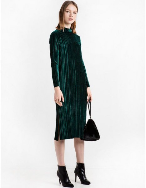 black midi pleated dress with stand-up collar and ankle boots