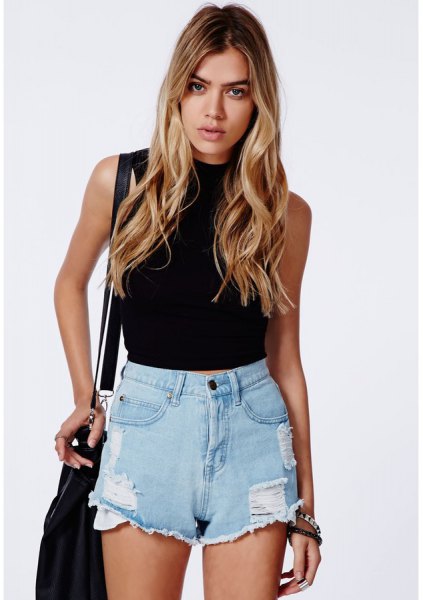 black, sleeveless, cropped sweater with high-waisted shorts