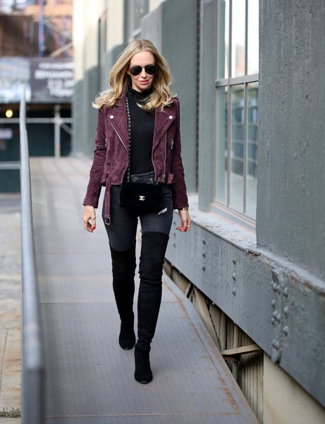 black moto jacket with mock neck sweater and overknee boots