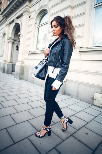 black moto jacket with white chiffon blouse with a relaxed fit