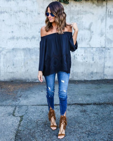 black off-the-shoulder blouse with skinny jeans