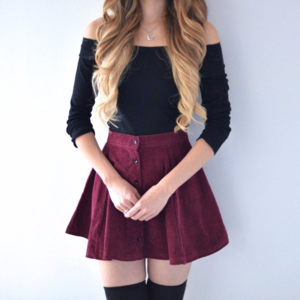 black strapless sweater with skater mini skirt with button placket