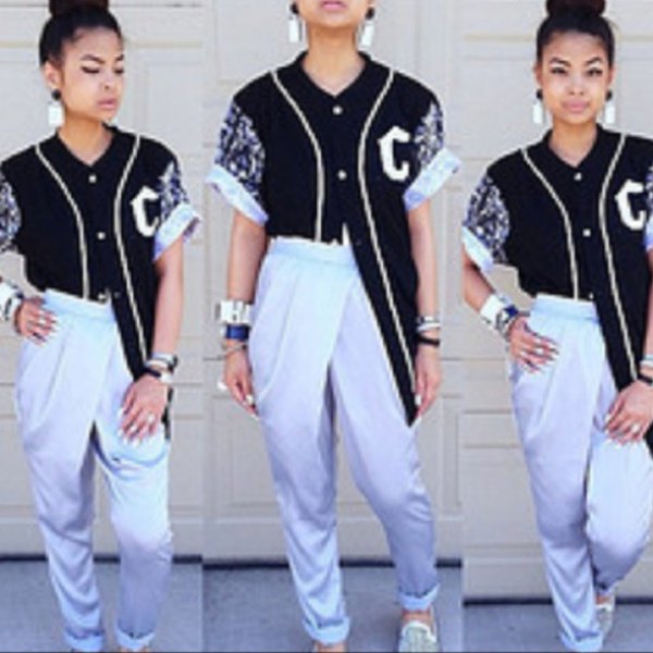 black oversized baseball jersey shirt with white pants with high cuffs