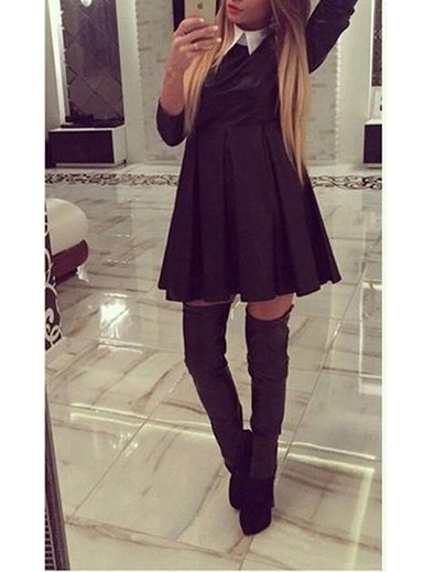 black pleated swing dress with gray overknee boots