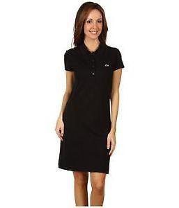 black polo shirt dress with white low-top sneakers