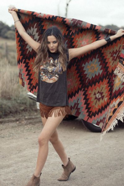 black printed t-shirt brown suede shorts with fringes