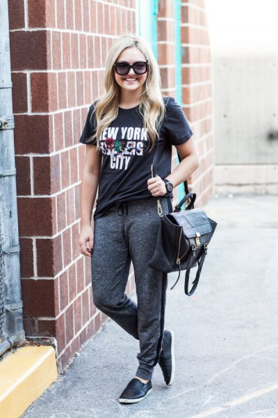 black printed t-shirt with dark gray jogger sweatpants