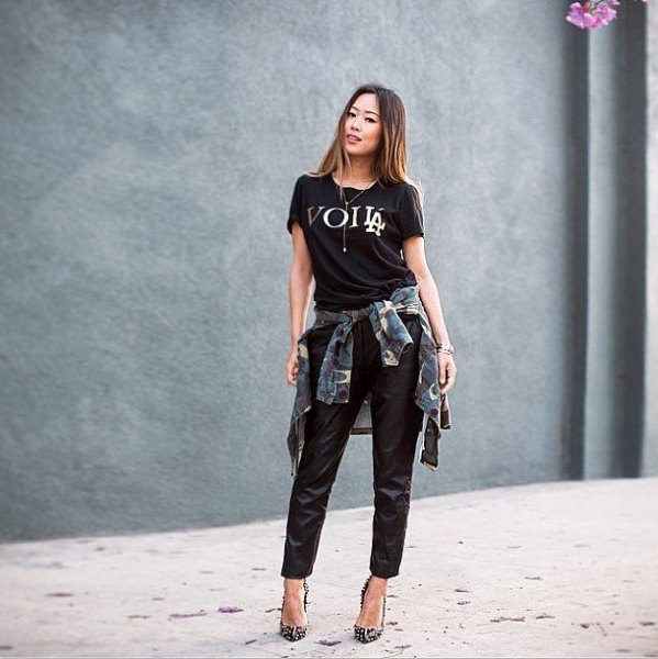 black printed t-shirt with leather pants and checked boyfriend shirt