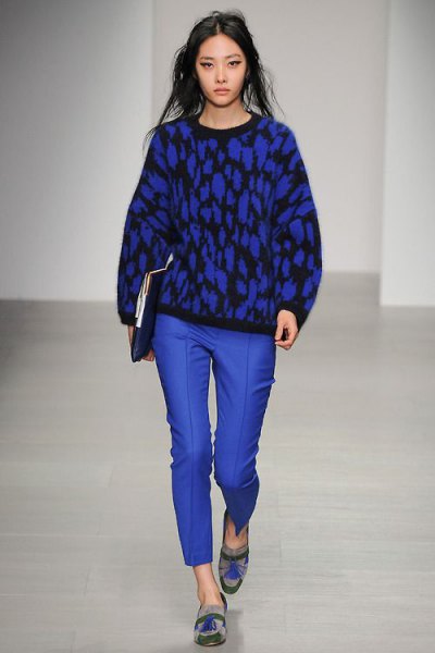 black printed knitted sweater with royal blue wax trousers and graphic evening shoes