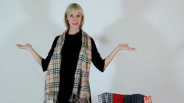 black sweater with mini skirt and red checked pashmina scarf