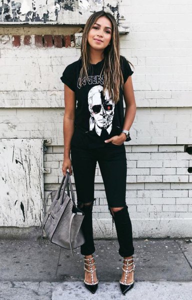 black graphic t-shirt with rolled sleeves, ripped jeans and sequin heels