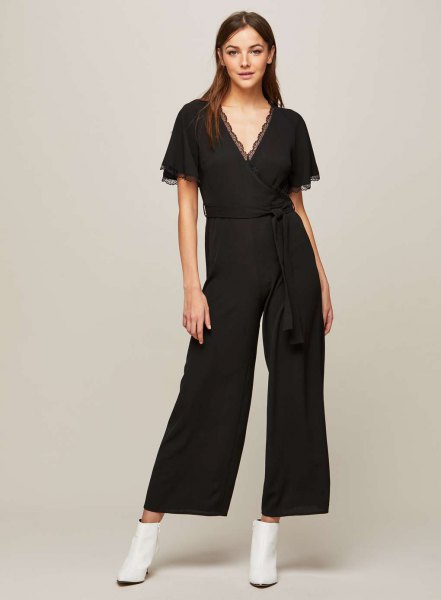 black scalloped overall with V-neck