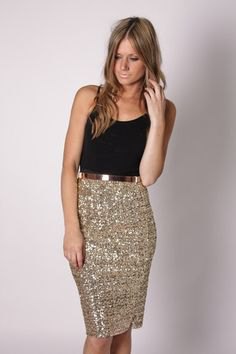 black tank top with scoop neckline and gold knee-length sequin skirt