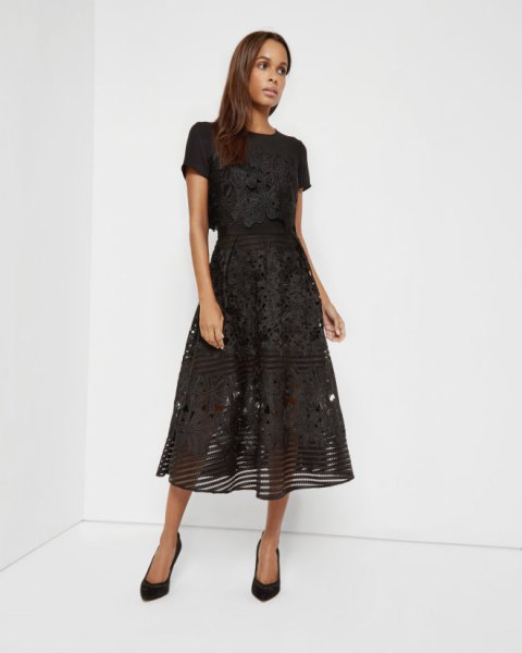 black, semi-transparent midi dress made of floral lace