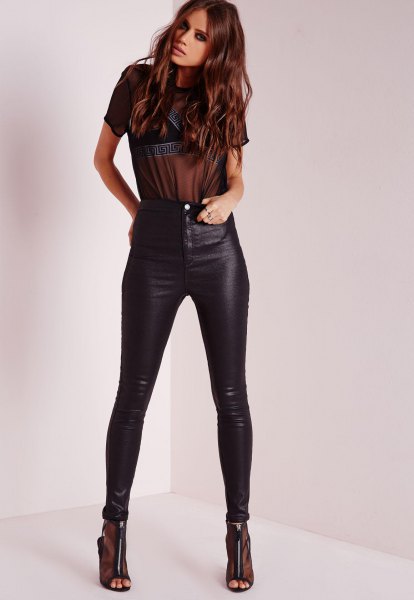 black, semi-transparent short-sleeved T-shirt with waxed skinny jeans