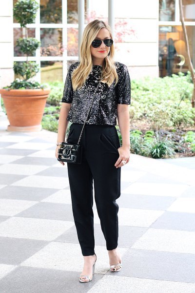 black sequin top with loosely cut suit trousers