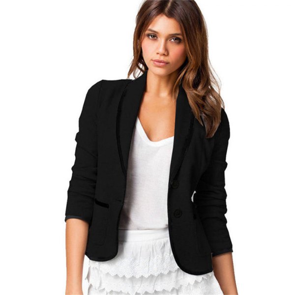 black, short-cut cotton blazer with a white miniskirt with a scalloped edge