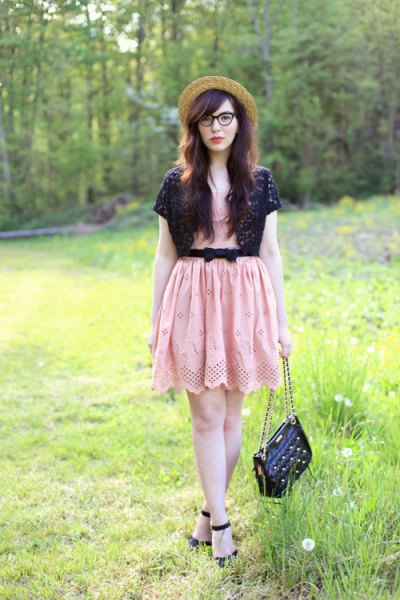 black shrug pink belt mini dress