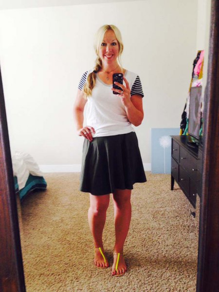black skater skirt and white t-shirt with scoop neckline and striped sleeves