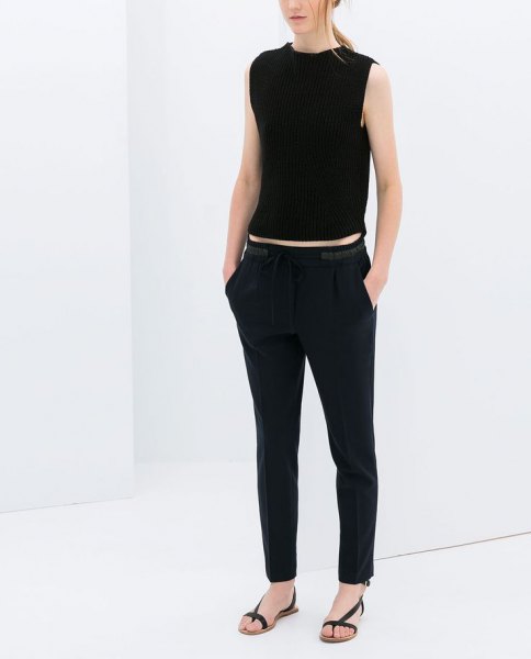 black sleeveless crop top with matching straight leg pants
