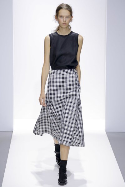 black sleeveless silk top with checked midi skirt