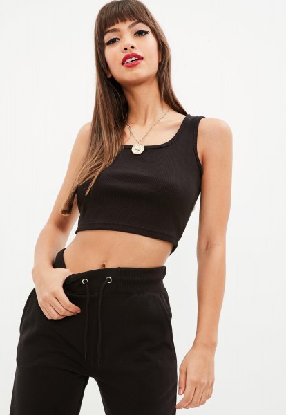 short tank top with black square neckline and jeans