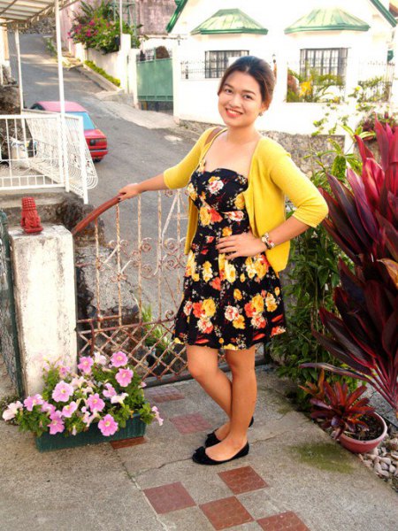 black strapless floral dress yellow sweater