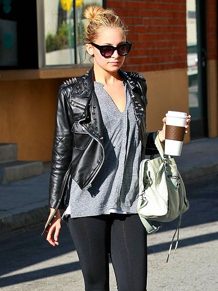 black leather jacket with rivets, gray V-neck t-shirt and leggings