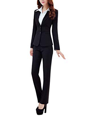 The black suit consists of a slim-fitting blazer and slightly flared trousers