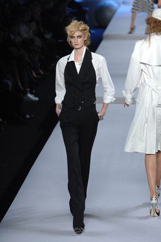 black suit vest with white shirt and suit trousers